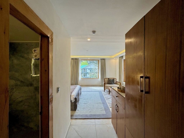 Imagen de la habitación del Hotel Ausnya Tirthan. Foto 9