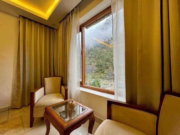 Imagen de la habitación del Hotel Ausnya Tirthan. Foto 10