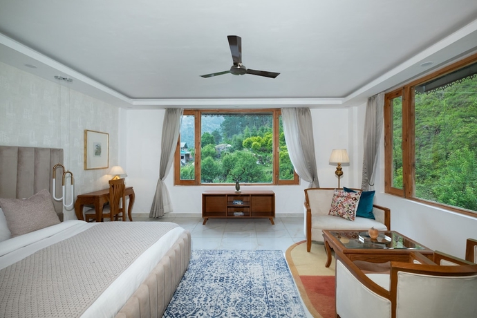 Imagen de la habitación del Hotel Ausnya Tirthan. Foto 12