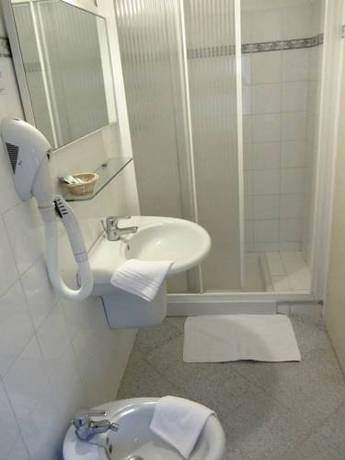 Imagen de la habitación del Hotel Ausonia, Follonica. Foto 7