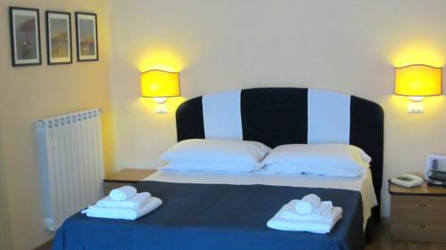 Imagen de la habitación del Hotel Ausonia, Follonica. Foto 10
