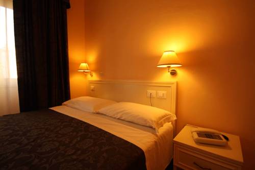 Imagen de la habitación del Hotel Ausonia, Follonica. Foto 15