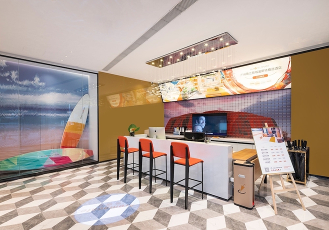 Imagen de los interiores del Hotel Ausotel Smart Zhujiang New Town Guangzhou. Foto 15