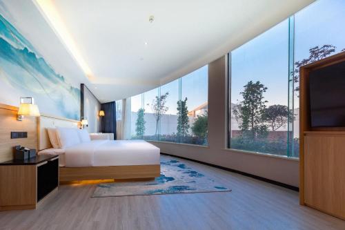 Imagen de la habitación del Hotel Ausotel by Argyle Baiyun Airport Renhe MTR. Foto 13