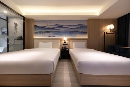 Imagen de la habitación del Hotel Ausotel by Argyle Baiyun Airport Renhe MTR. Foto 14