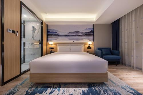 Imagen de la habitación del Hotel Ausotel by Argyle Baiyun Airport Renhe MTR. Foto 15