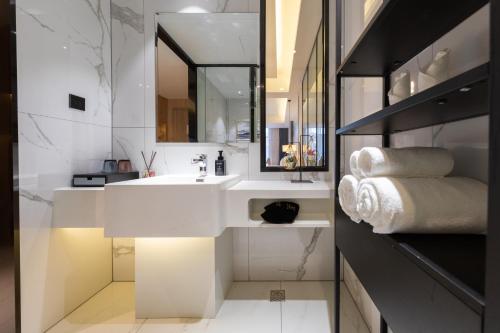 Imagen de la habitación del Hotel Ausotel by Argyle Baiyun Airport Renhe MTR. Foto 17