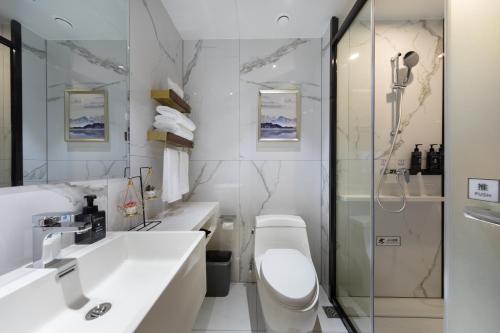 Imagen de la habitación del Hotel Ausotel by Argyle Baiyun Airport Renhe MTR. Foto 18