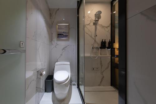 Imagen de la habitación del Hotel Ausotel by Argyle Baiyun Airport Renhe MTR. Foto 19