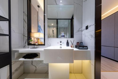 Imagen de la habitación del Hotel Ausotel by Argyle Baiyun Airport Renhe MTR. Foto 20