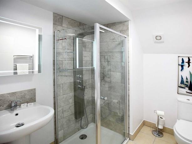 Imagen de la habitación del Hotel Austen\'s Luxury Apartments. Foto 12