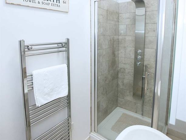 Imagen de la habitación del Hotel Austen\'s Luxury Apartments. Foto 13