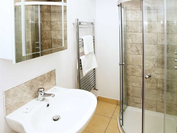 Imagen de la habitación del Hotel Austen\'s Luxury Apartments. Foto 15