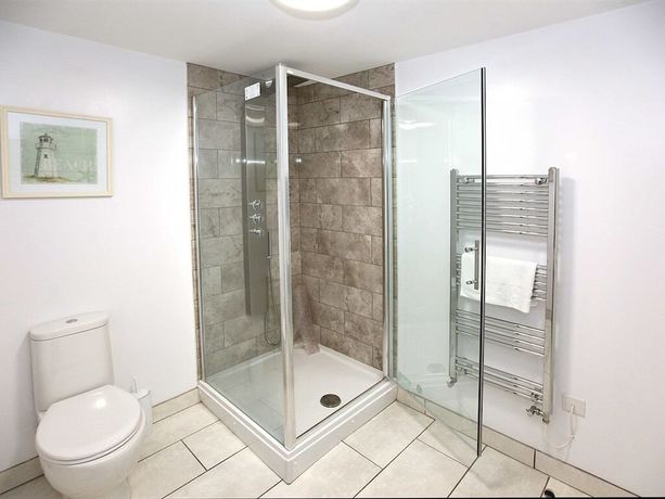 Imagen de la habitación del Hotel Austen\'s Luxury Apartments. Foto 17