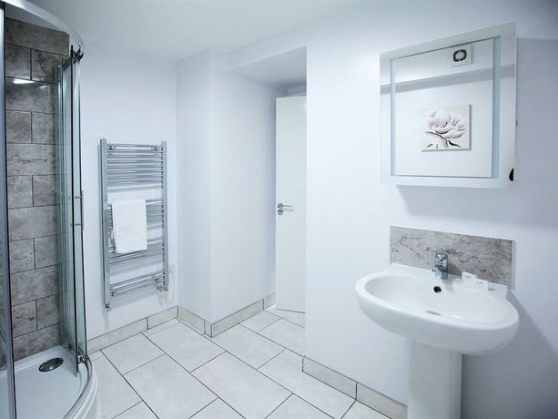 Imagen de la habitación del Hotel Austen\'s Luxury Apartments. Foto 19