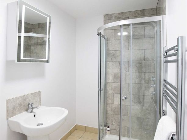 Imagen de la habitación del Hotel Austen\'s Luxury Apartments. Foto 20