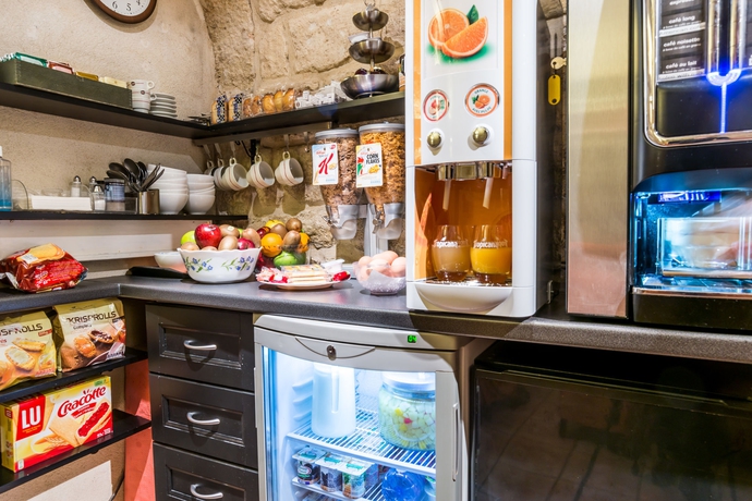 Imagen del bar/restaurante del Hotel Austins Saint Lazare. Foto 3