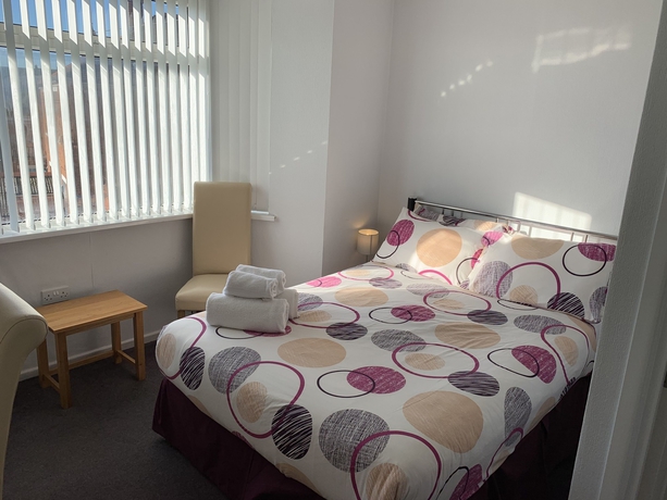 Imagen de la habitación del Hotel Austins Self Service Guest House. Foto 11