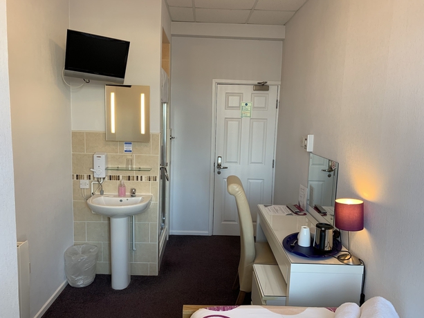 Imagen de la habitación del Hotel Austins Self Service Guest House. Foto 18