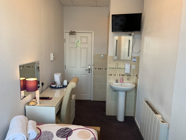 Imagen de la habitación del Hotel Austins Self Service Guest House. Foto 19