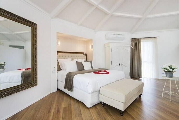 Imagen de la habitación del Hotel Austinvilla Estate. Foto 11