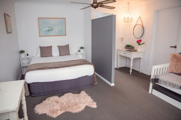 Imagen de la habitación del Hotel Austinvilla Estate. Foto 12