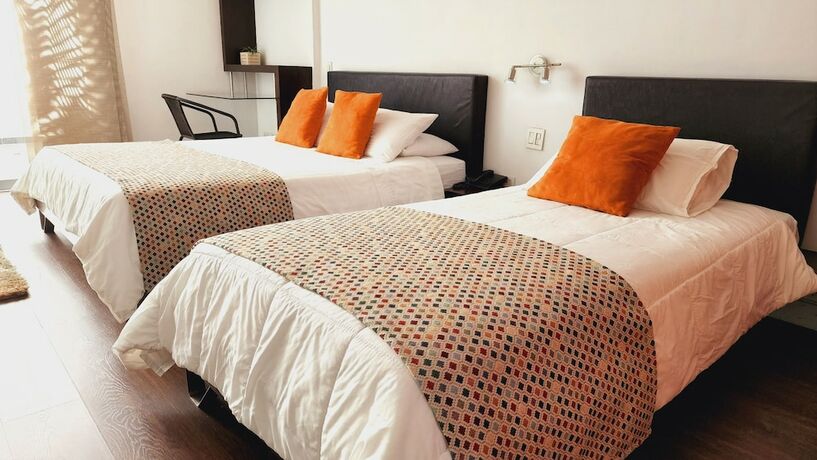 Imagen de la habitación del Hotel Austral Suites, Cali. Foto 16