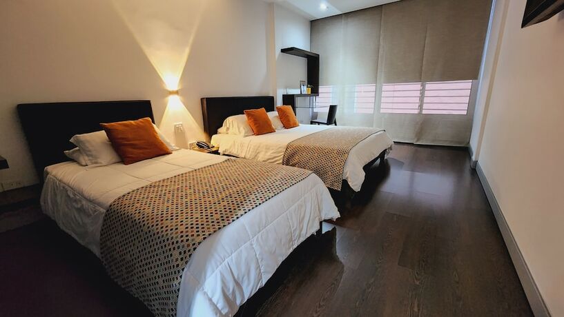 Imagen de la habitación del Hotel Austral Suites, Cali. Foto 17