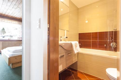 Imagen de la habitación del Hotel Austria Alpinhotel. Foto 10