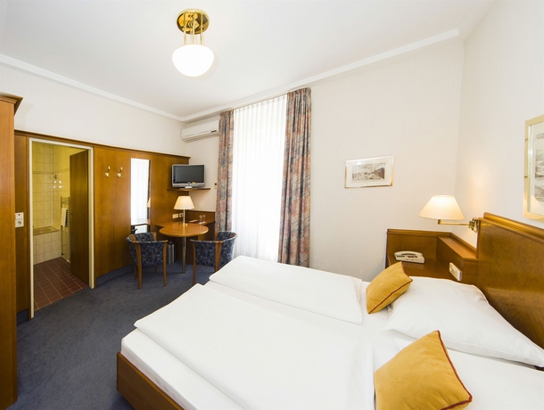 Imagen de la habitación del Hotel Austria Classic Viena. Foto 10