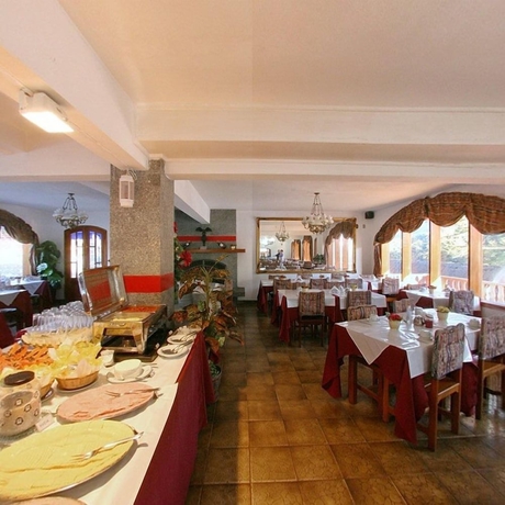 Imagen del bar/restaurante del Hotel Austria, Monte Verde. Foto 7