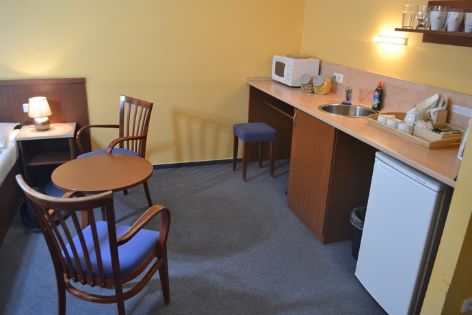 Imagen de la habitación del Hotel Austria Suites. Foto 6