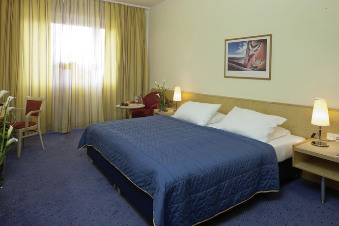 Imagen de la habitación del Hotel Austria Trend Europa Salzburg. Foto 7