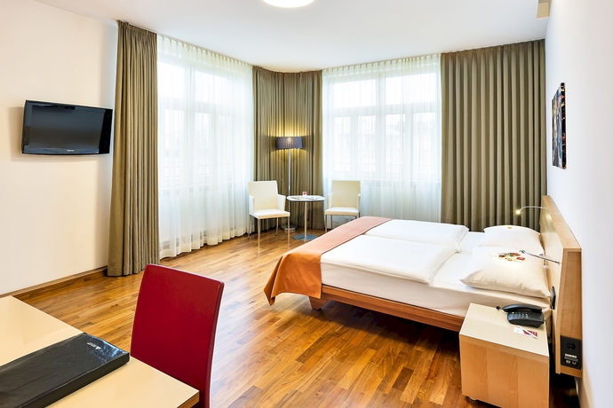 Imagen de la habitación del Hotel Austria Trend Hotel Europa. Foto 5