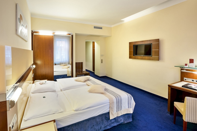 Imagen de los interiores del Hotel Austria Trend Hotel Europa. Foto 14