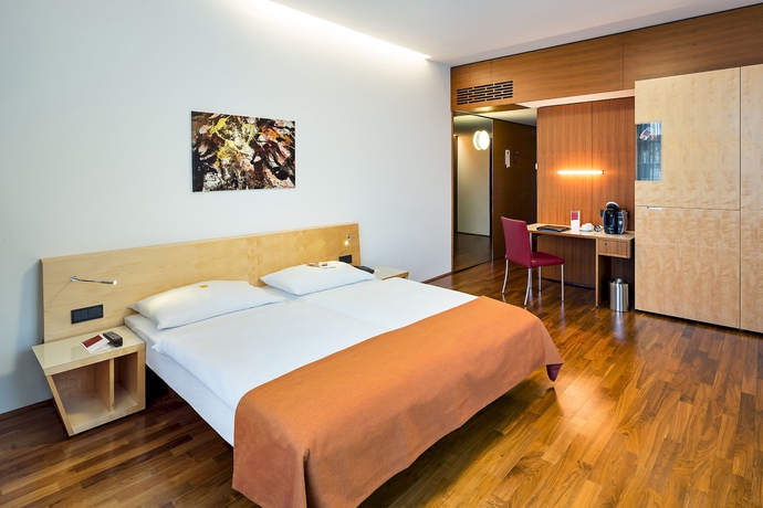 Imagen de la habitación del Hotel Austria Trend Hotel Europa. Foto 7