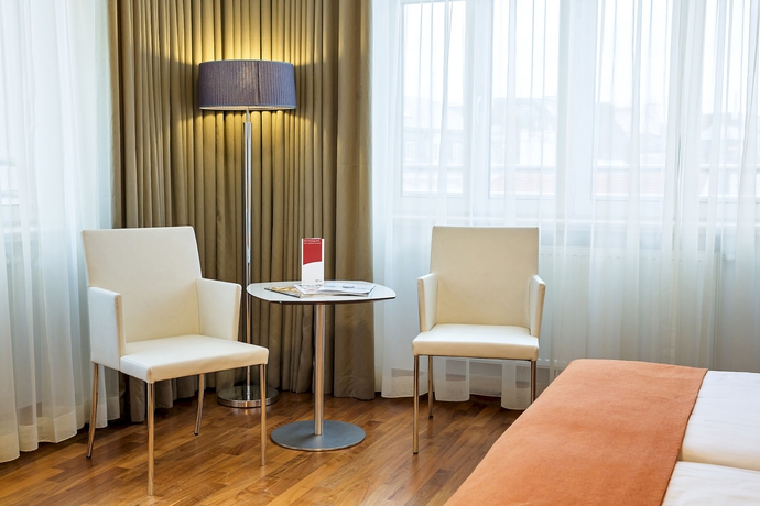 Imagen de la habitación del Hotel Austria Trend Hotel Europa. Foto 9