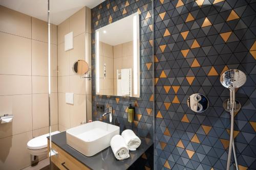 Imagen de la habitación del Hotel Austria Trend Maximilian. Foto 10