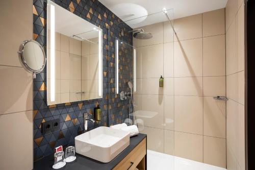 Imagen de la habitación del Hotel Austria Trend Maximilian. Foto 11