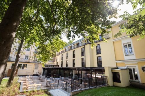 Imagen de los exteriores del Hotel Austria Trend Maximilian. Foto 13