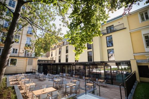 Imagen del bar/restaurante del Hotel Austria Trend Maximilian. Foto 7