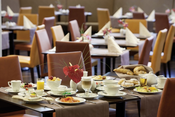 Imagen del bar/restaurante del Hotel Austria Trend Savoyen. Foto 5