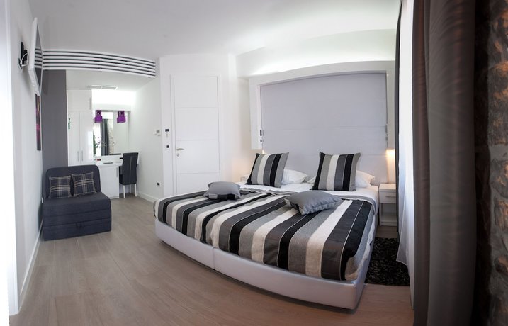 Imagen de la habitación del Hotel Authentic Luxury Rooms. Foto 3