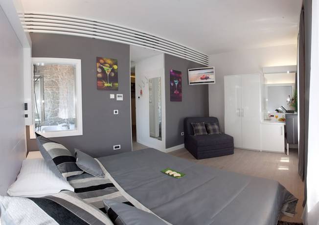 Imagen de la habitación del Hotel Authentic Luxury Rooms. Foto 7