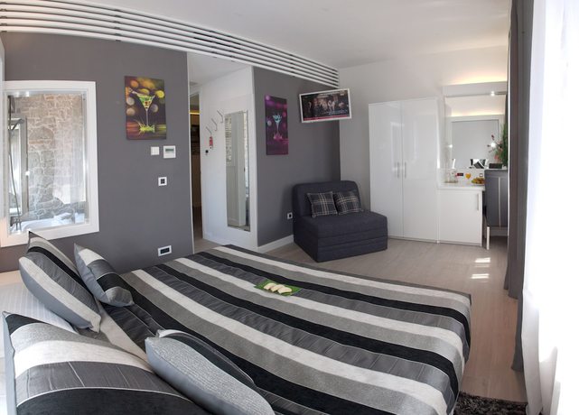 Imagen de la habitación del Hotel Authentic Luxury Rooms. Foto 8