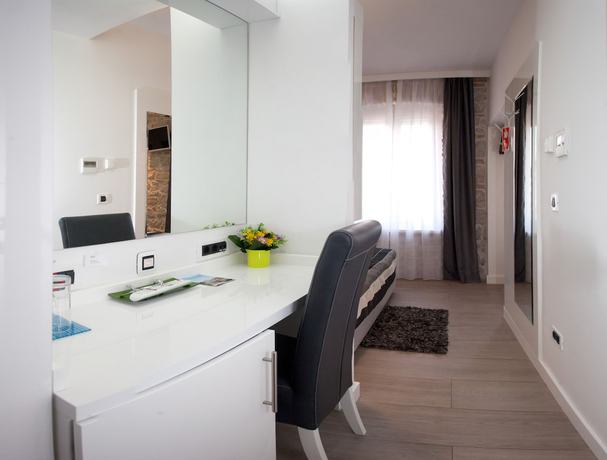 Imagen de la habitación del Hotel Authentic Luxury Rooms. Foto 9