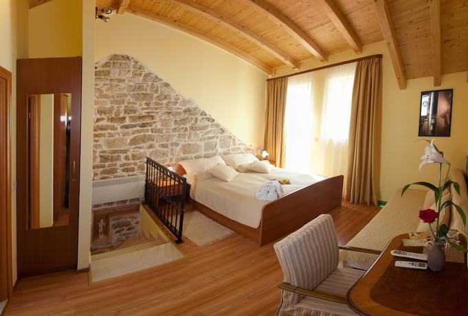 Imagen de la habitación del Hotel Authentic Luxury Rooms. Foto 10