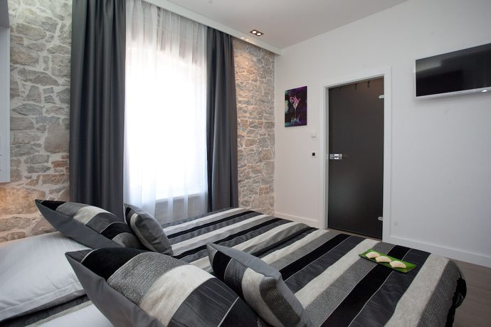 Imagen de la habitación del Hotel Authentic Luxury Rooms. Foto 11