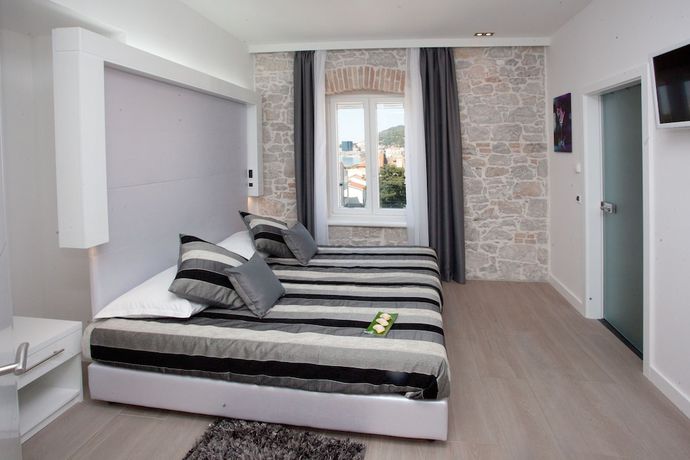 Imagen de la habitación del Hotel Authentic Luxury Rooms. Foto 12