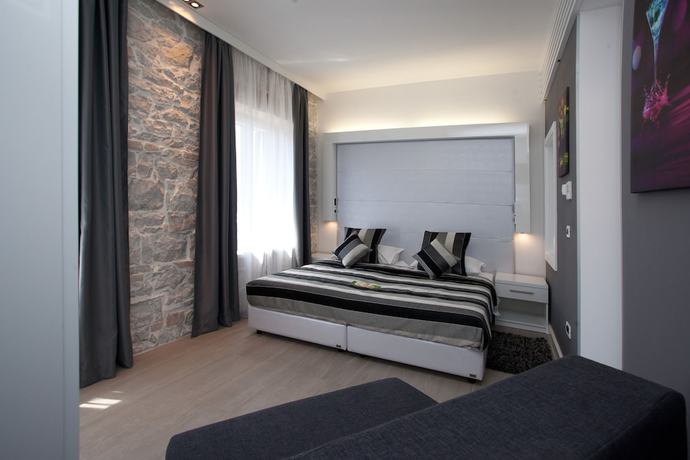 Imagen de la habitación del Hotel Authentic Luxury Rooms. Foto 13